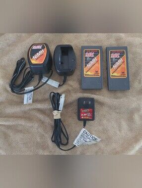 New Bright 9.6V NiMH Battery Charger and PacksNew Bright 9.6 Volts 1200 Bundle